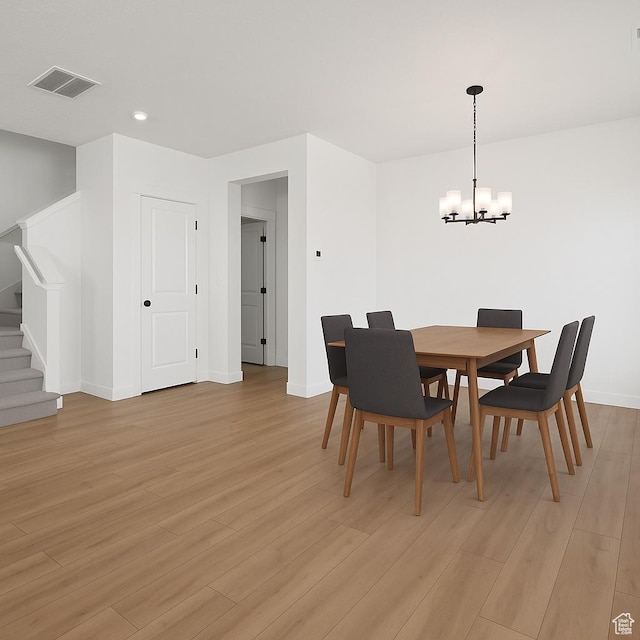 4945 W Willowbank Dr W, Highland, UT 84003 - dining area featuring stairs, a chandelier, light wood finished floors, baseboards, and recessed lighting