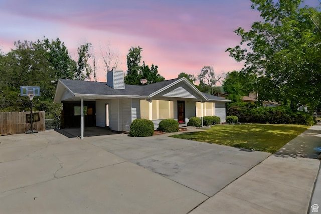 9224 S Benson Way, Sandy, UT 84070 - single story home with concrete driveway, a carport, and a chimney