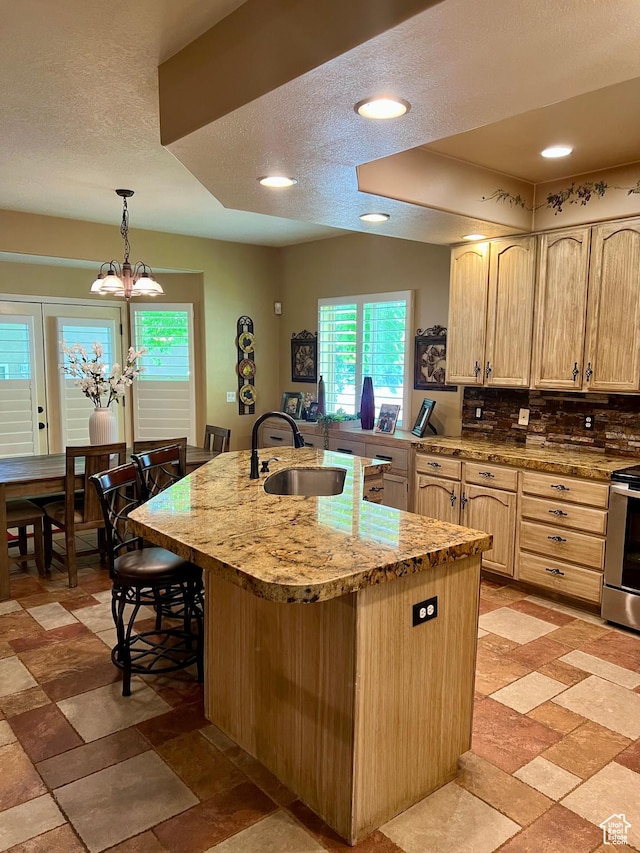 93 E Sweet Berry Ct, Draper, UT 84020 - kitchen featuring light brown cabinets, a sink, range, plenty of natural light, and a textured ceiling