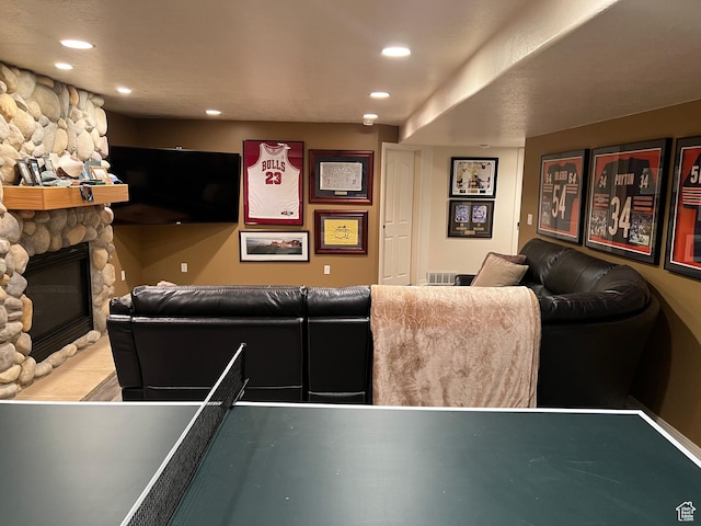 93 E Sweet Berry Ct, Draper, UT 84020 - cinema room featuring recessed lighting and a stone fireplace