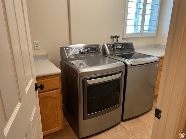 93 E Sweet Berry Ct, Draper, UT 84020 - laundry room featuring independent washer and dryer, light tile patterned floors, and cabinet space