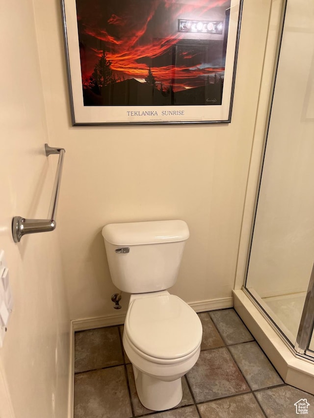 93 E Sweet Berry Ct, Draper, UT 84020 - full bath with baseboards, a shower stall, toilet, and tile patterned flooring