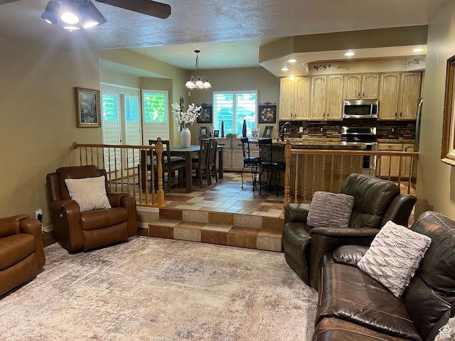 93 E Sweet Berry Ct, Draper, UT 84020 - living room with a chandelier, a ceiling fan, and recessed lighting