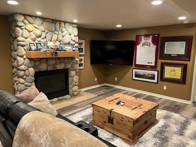 93 E Sweet Berry Ct, Draper, UT 84020 - living room with a stone fireplace, wood finished floors, and recessed lighting