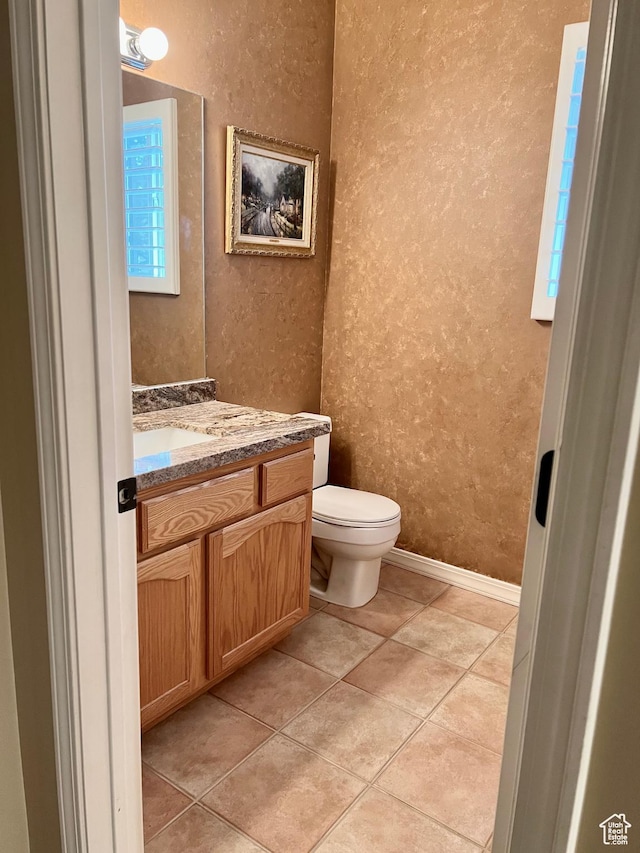 93 E Sweet Berry Ct, Draper, UT 84020 - bathroom with a textured wall, vanity, toilet, baseboards, and tile patterned floors
