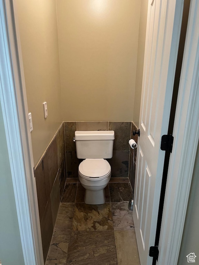 93 E Sweet Berry Ct, Draper, UT 84020 - bathroom featuring a wainscoted wall and toilet