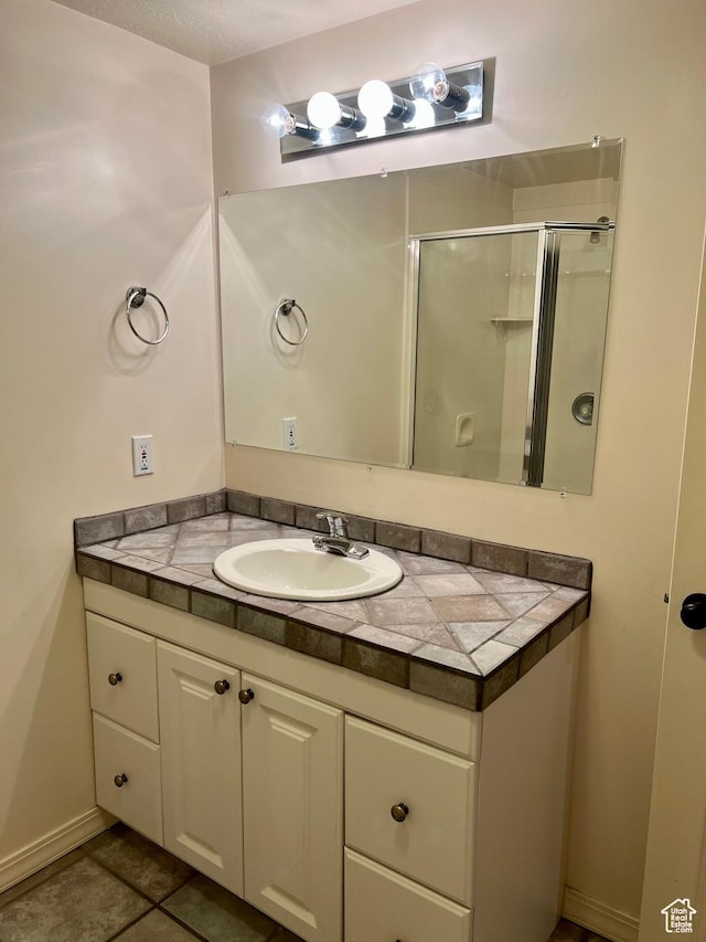 93 E Sweet Berry Ct, Draper, UT 84020 - bathroom with vanity, a stall shower, and tile patterned flooring