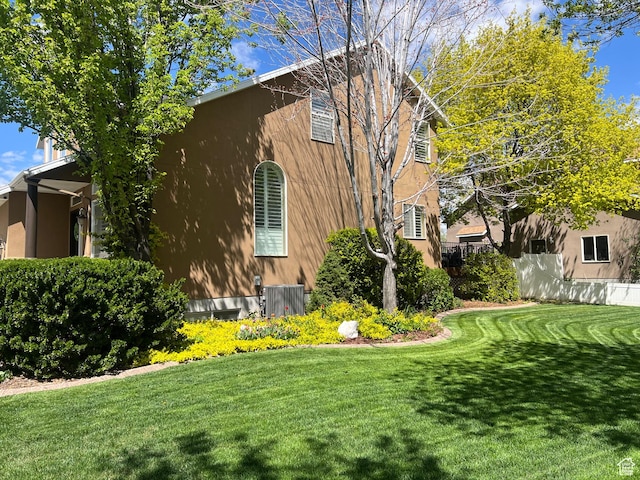 93 E Sweet Berry Ct, Draper, UT 84020 - view of home's exterior featuring cooling unit and stucco siding