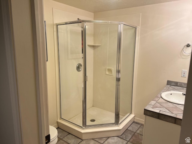 93 E Sweet Berry Ct, Draper, UT 84020 - full bathroom featuring a stall shower, vanity, and toilet