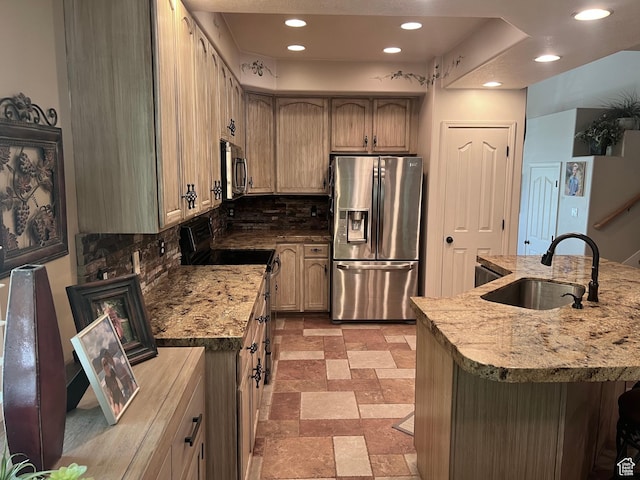 93 E Sweet Berry Ct, Draper, UT 84020 - kitchen with appliances with stainless steel finishes, a sink, tasteful backsplash, recessed lighting, and light stone counters