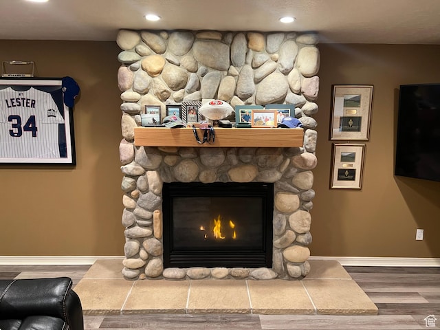 93 E Sweet Berry Ct, Draper, UT 84020 - detailed view of a fireplace, wood finished floors, baseboards, and recessed lighting