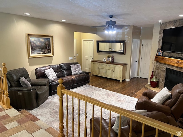 93 E Sweet Berry Ct, Draper, UT 84020 - living room with ceiling fan, a fireplace, recessed lighting, and wood finished floors