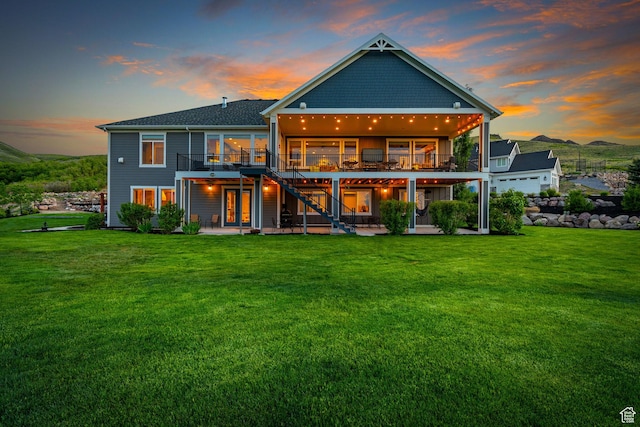 15113 S Cedar Meadow Cir, Herriman, UT 84096 - back of house featuring a patio area, a wooden deck, a yard, and stairway