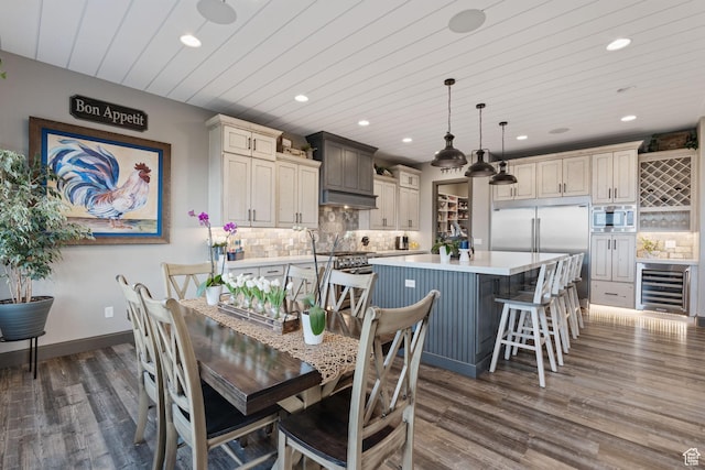 15113 S Cedar Meadow Cir, Herriman, UT 84096 - dining area with wine cooler, recessed lighting, dark wood-style floors, baseboards, and wooden ceiling