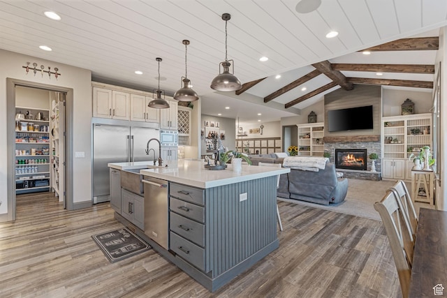 15113 S Cedar Meadow Cir, Herriman, UT 84096 - kitchen with built in appliances, wood finished floors, gray cabinets, recessed lighting, and light countertops