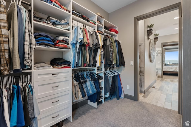 15113 S Cedar Meadow Cir, Herriman, UT 84096 - walk in closet featuring light carpet