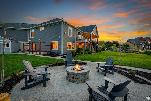 15113 S Cedar Meadow Cir, Herriman, UT 84096 - rear view of property with a fire pit, a yard, and a patio