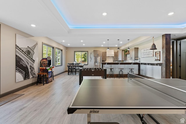 15113 S Cedar Meadow Cir, Herriman, UT 84096 - game room featuring light wood finished floors, a tray ceiling, recessed lighting, and baseboards
