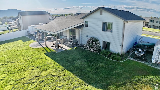 1410 W 3390 S, Nibley, UT 84321 - rear view of property with a patio area, an outdoor hangout area, roof with shingles, and a mountain view