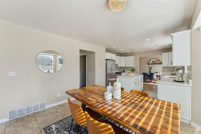 926 N 600 W, American Fork, UT 84003 - dining area with light tile patterned floors, baseboards, and recessed lighting