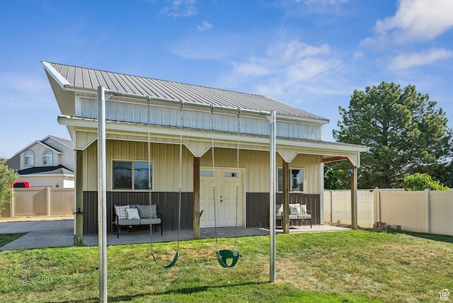 926 N 600 W, American Fork, UT 84003 - rear view of property featuring a patio area, metal roof, and outdoor lounge area