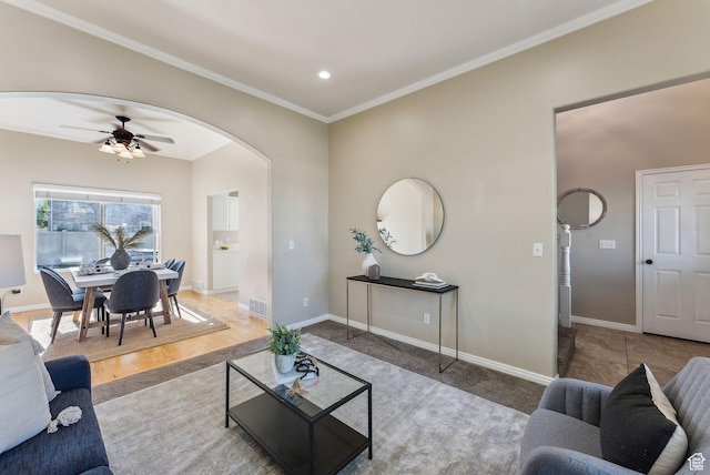 926 N 600 W, American Fork, UT 84003 - living area featuring arched walkways, ceiling fan, baseboards, crown molding, and wood finished floors