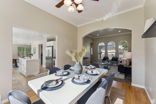 926 N 600 W, American Fork, UT 84003 - dining space with arched walkways, plenty of natural light, ceiling fan, crown molding, and baseboards