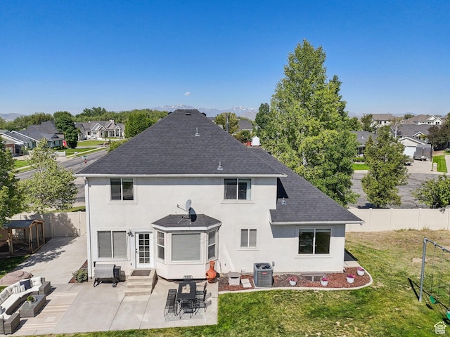 926 N 600 W, American Fork, UT 84003 - rear view of house featuring entry steps, a shingled roof, a patio, stucco siding, and central air condition unit