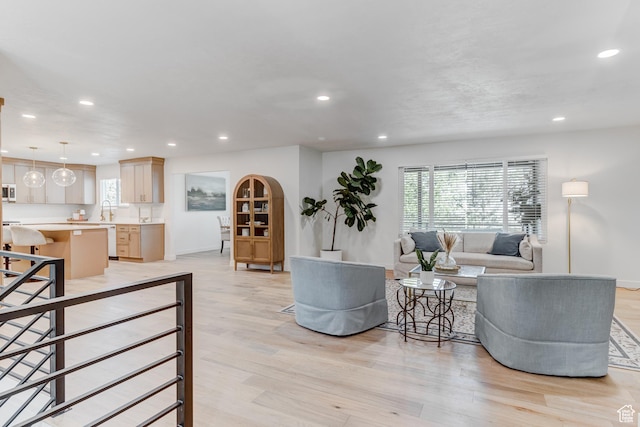 7474 S Brighton Way, Cottonwood Heights, UT 84121 - living room featuring recessed lighting, light wood-style flooring, and baseboards