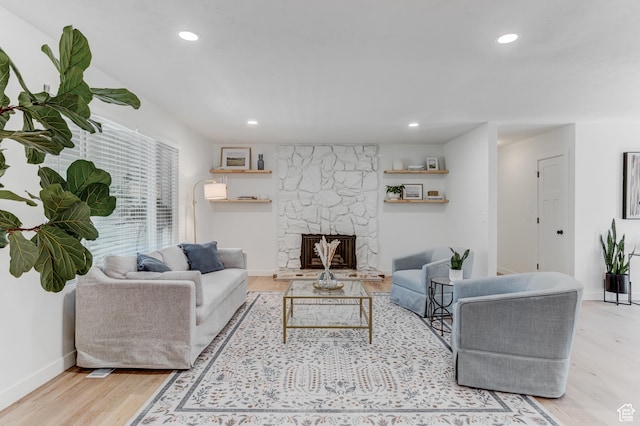 7474 S Brighton Way, Cottonwood Heights, UT 84121 - living area with wood finished floors, recessed lighting, a stone fireplace, and baseboards