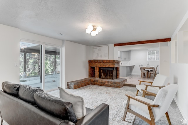 7474 S Brighton Way, Cottonwood Heights, UT 84121 - living room featuring a brick fireplace, a textured ceiling, and baseboards