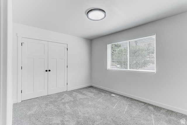 7474 S Brighton Way, Cottonwood Heights, UT 84121 - unfurnished bedroom with carpet, baseboards, and a closet