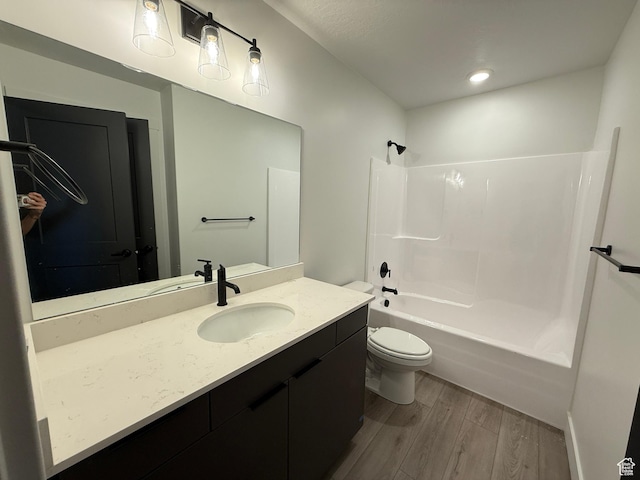 3664 S 4600 W Unit 222, West Haven, UT 84401 - full bathroom with wood finished floors, toilet, vanity, and shower / bathtub combination