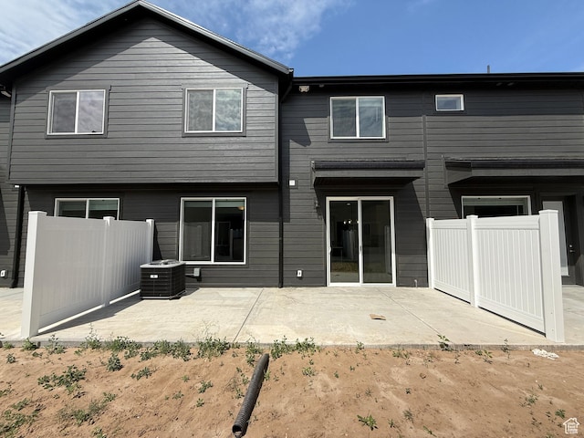 3664 S 4600 W Unit 222, West Haven, UT 84401 - rear view of house featuring a patio and central AC