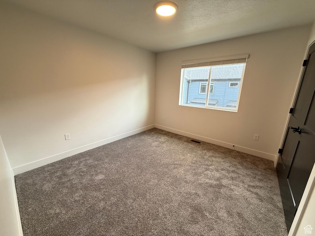 3664 S 4600 W Unit 222, West Haven, UT 84401 - spare room with carpet floors and baseboards