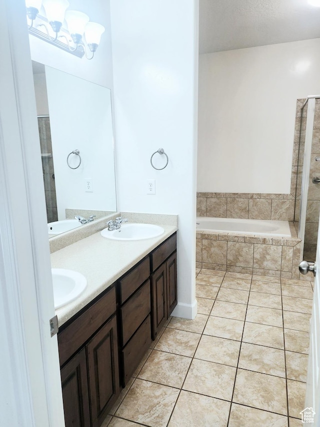 246 E Topspin Way, Lehi, UT 84043 - full bathroom featuring double vanity, tile patterned flooring, and a relaxing tiled tub