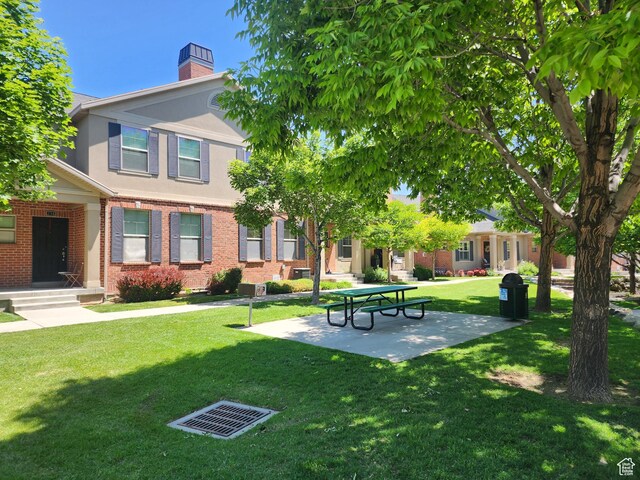 246 E Topspin Way, Lehi, UT 84043 - view of property's community featuring a lawn