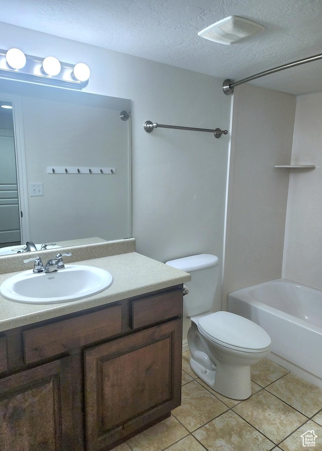246 E Topspin Way, Lehi, UT 84043 - full bathroom with vanity, a textured ceiling, tile patterned floors, toilet, and  shower combination