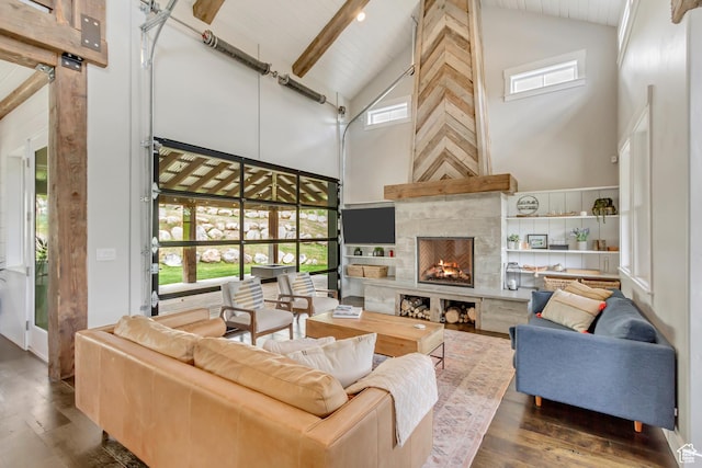 1685 N 300 E, Midway, UT 84049 - living area featuring high vaulted ceiling, wood-type flooring, a tiled fireplace, healthy amount of natural light, and beamed ceiling