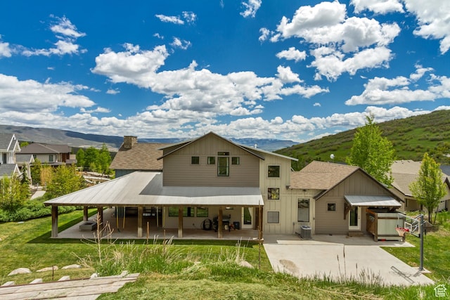 1685 N 300 E, Midway, UT 84049 - rear view of house with a patio area, a mountain view, and roof with shingles