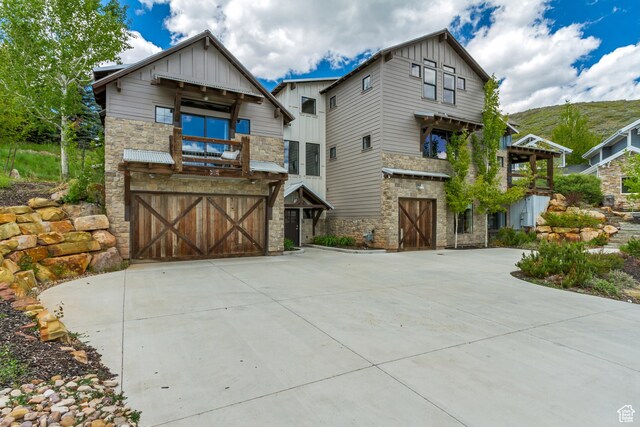 1685 N 300 E, Midway, UT 84049 - craftsman inspired home featuring stone siding, board and batten siding, and an attached garage