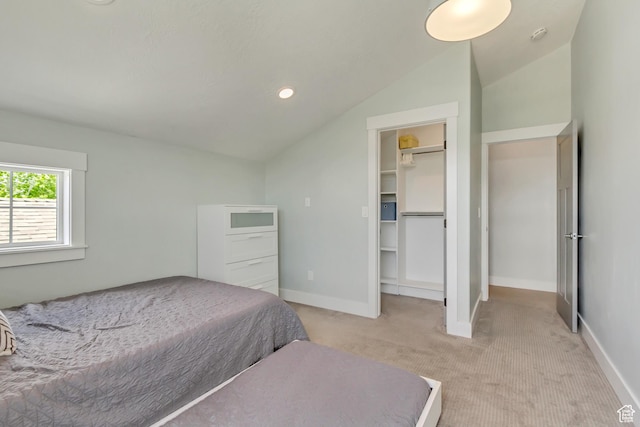 1685 N 300 E, Midway, UT 84049 - bedroom with light carpet, vaulted ceiling, baseboards, a walk in closet, and recessed lighting