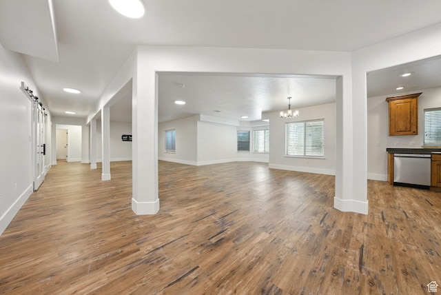 3444 N 180 E, Provo, UT 84604 - unfurnished living room with wood finished floors, a chandelier, baseboards, and recessed lighting