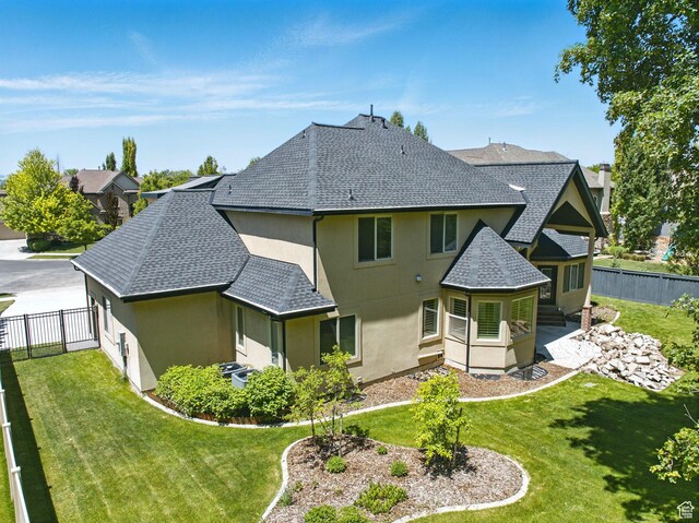 3444 N 180 E, Provo, UT 84604 - rear view of house with stucco siding and roof with shingles