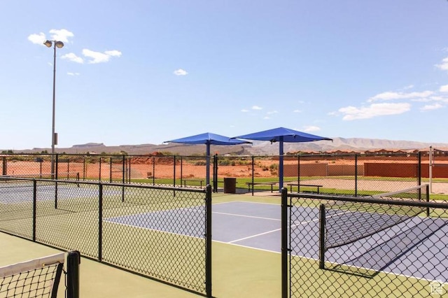 3800 Paradise Village Dr Unit 84, Santa Clara, UT 84765 - view of tennis court with a mountain view