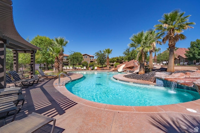 3800 Paradise Village Dr Unit 84, Santa Clara, UT 84765 - community pool featuring a patio area