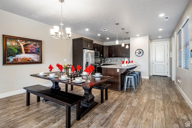 3800 Paradise Village Dr Unit 84, Santa Clara, UT 84765 - dining room featuring light wood-style floors, baseboards, a chandelier, and recessed lighting