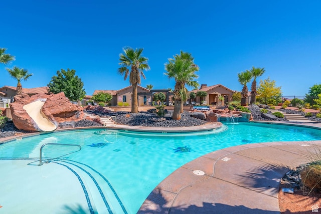 3800 Paradise Village Dr Unit 84, Santa Clara, UT 84765 - swimming pool featuring a water slide