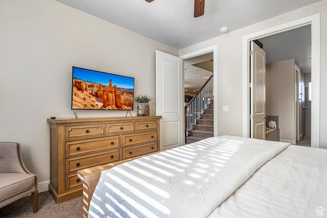 3800 Paradise Village Dr Unit 84, Santa Clara, UT 84765 - carpeted bedroom featuring baseboards and a ceiling fan