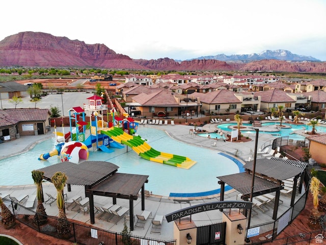 3800 Paradise Village Dr Unit 84, Santa Clara, UT 84765 - community pool with a water play area, a residential view, and a mountain view